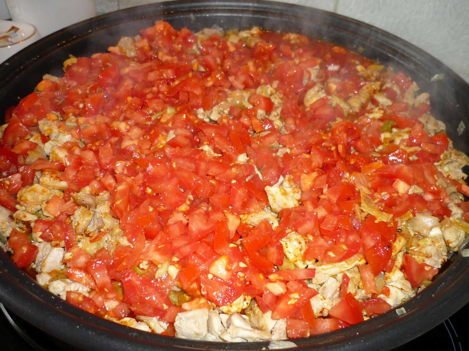 Tavuk Sote Rezept - Tomaten hinzufügen
